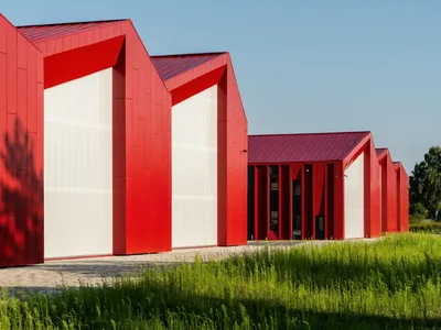 Aranchii Architects Disguise a Ukrainian Logistics Hub as a Village of Red Gabled Houses