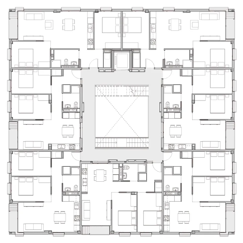 Floor plan drawing depicting multiple residential units distributed around a central atrium with stairs