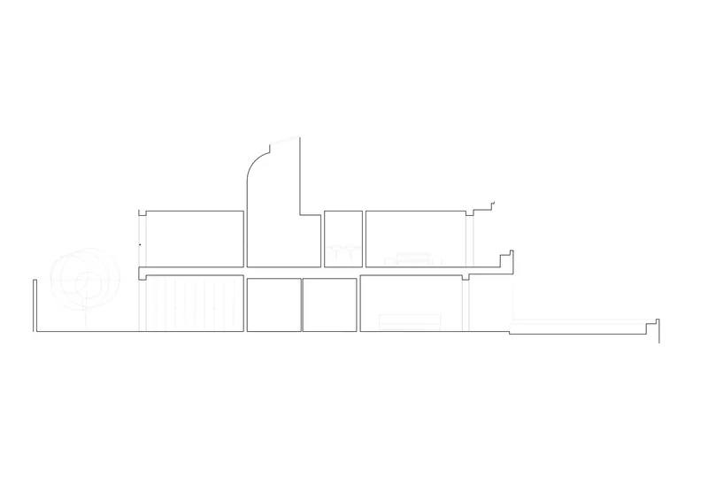 Section drawing showing two-level volume with split-level floors and circulation spaces
