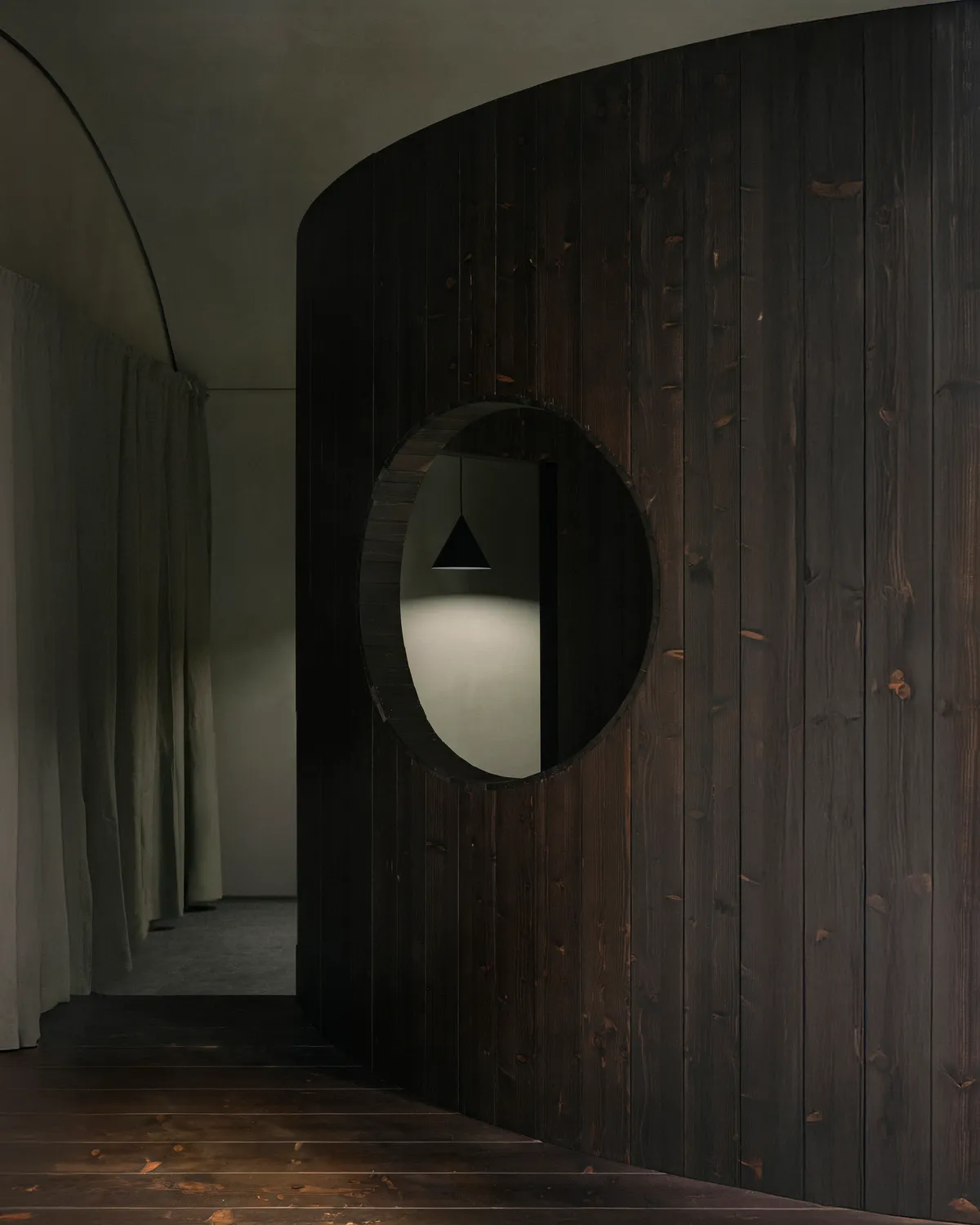 AACM Carves a 50-Square-Meter Ceramic Workshop from Curved Timber and Shadow in Milan