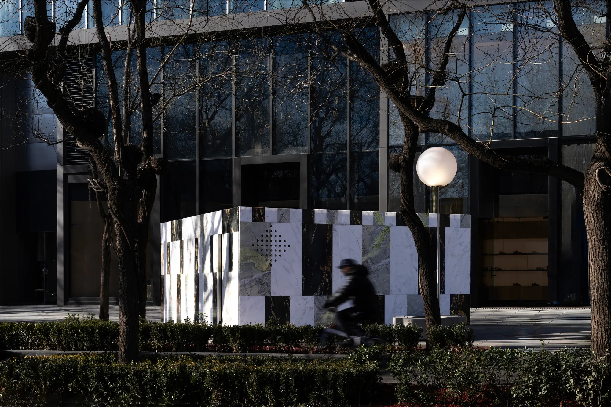 Bufen Atelier Carves a Marble Monolith into a Sidewalk Kiosk on a Beijing Avenue