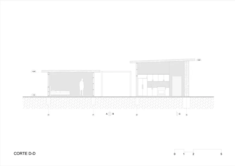 Section drawing illustrating split-level volumes with lower bedroom wing and elevated living area