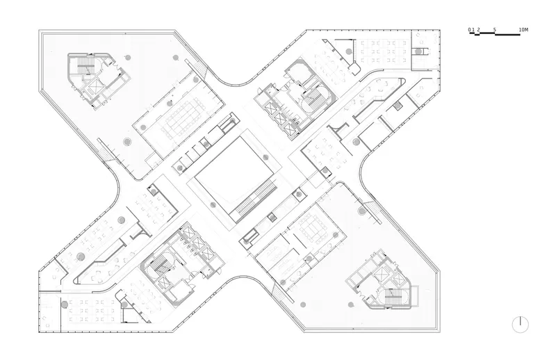 Floor plan drawing illustrating four branching volumes with interconnected rooms and interior courtyards
