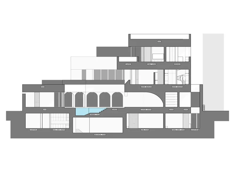 Section drawing showing multi-level spaces with arched openings and a small pool on one level