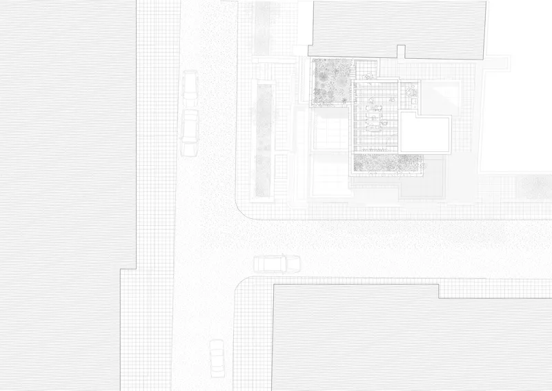 Site plan drawing depicting the building footprint with planted terraces at the street corner