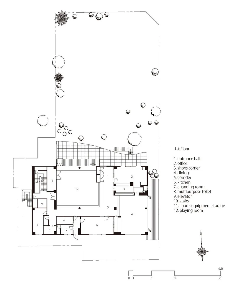 First floor plan drawing showing entrance hall, offices, dining areas and outdoor courtyard with trees