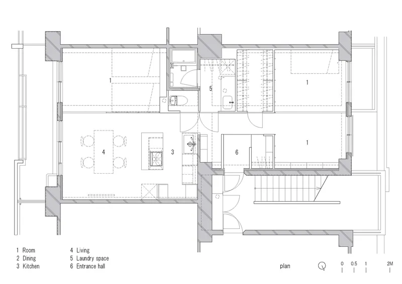 Floor plan drawing showing a compact apartment layout with living areas, kitchen, bathroom and two sleeping rooms