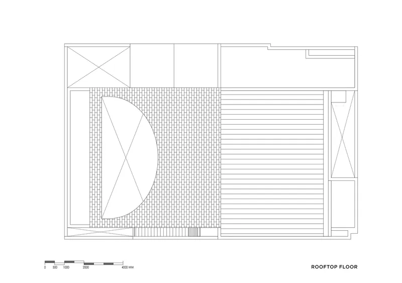 Rooftop floor plan drawing showing a terrace with tiled paving, wood decking and a small stair access