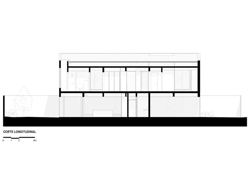 Longitudinal section drawing showing interior volumes and spatial relationships across both floors