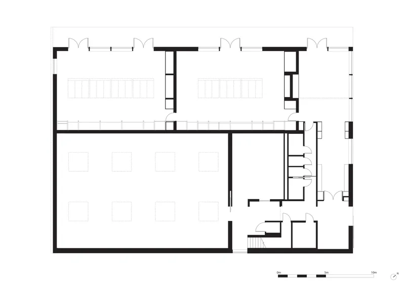 Floor plan drawing showing gallery spaces with skylight bays and adjacent service rooms