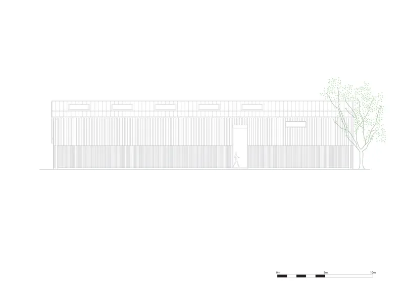 Elevation drawing of the long facade with clerestory windows and a figure near a tree