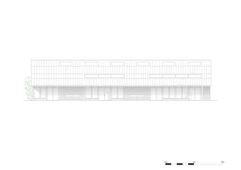 Elevation drawing showing the barn with upper clerestory band and recessed lower openings