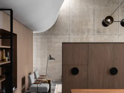 Studio Gram Unfurls a Concrete Curve Through an Adelaide Queen Anne Villa