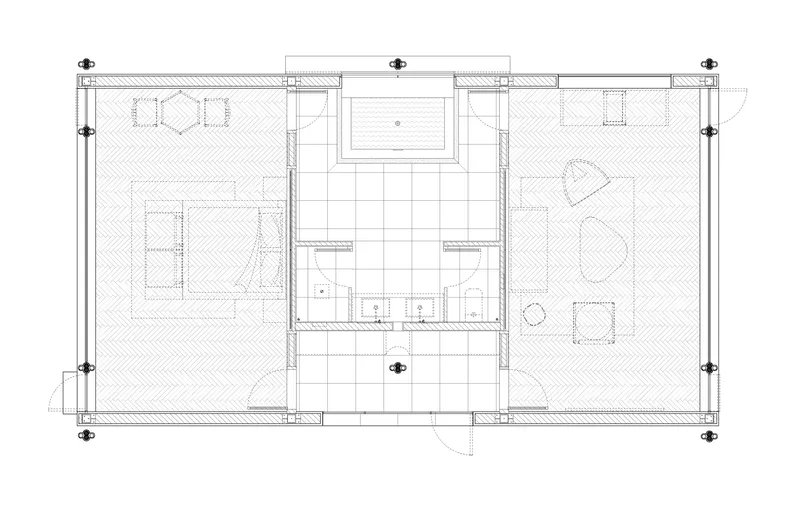 Floor plan drawing showing two open rooms flanking a central bathroom and kitchen zone
