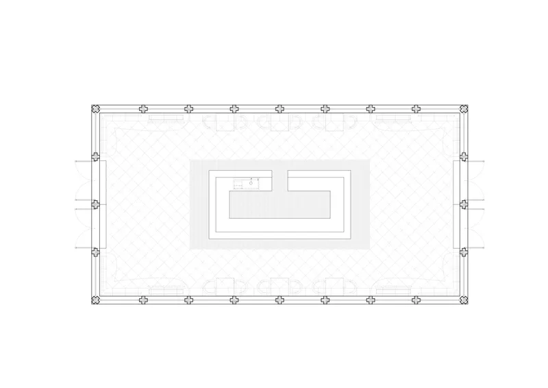 Floor plan drawing showing a rectangular space with perimeter columns and a central sunken area