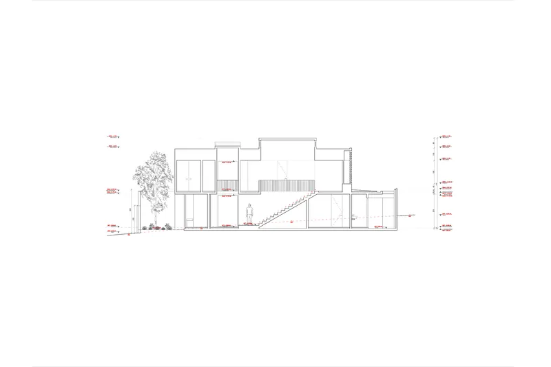 Section drawing revealing interior spatial connections with an external staircase and planted areas