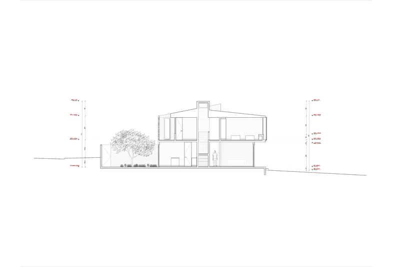 Section drawing showing a two-story residence with a tree in the courtyard and figure for scale