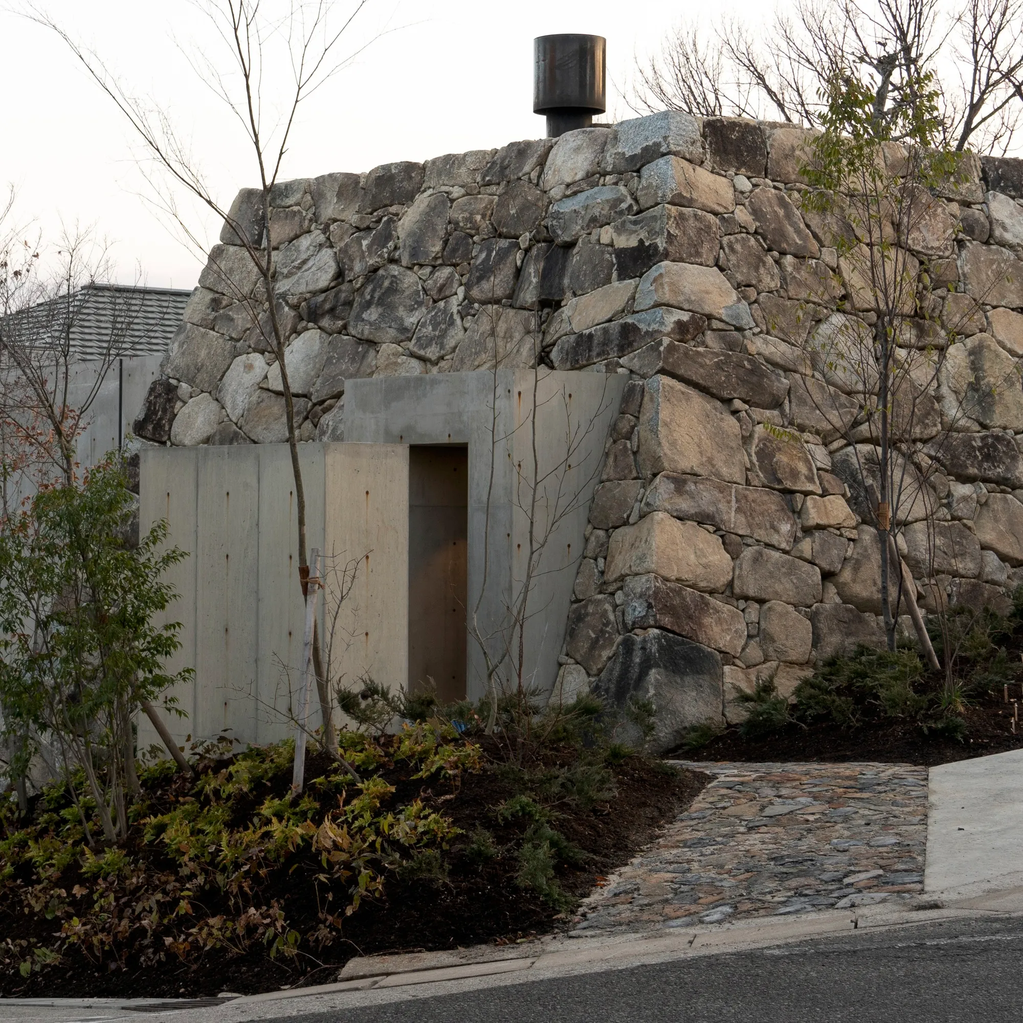 Tomoaki Uno Architects Builds an Aztec-Inspired Stone Pyramid House in Nagoya