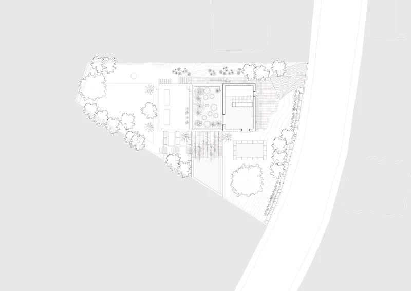 Top floor plan drawing showing rooms with an interior courtyard and rooftop planted areas