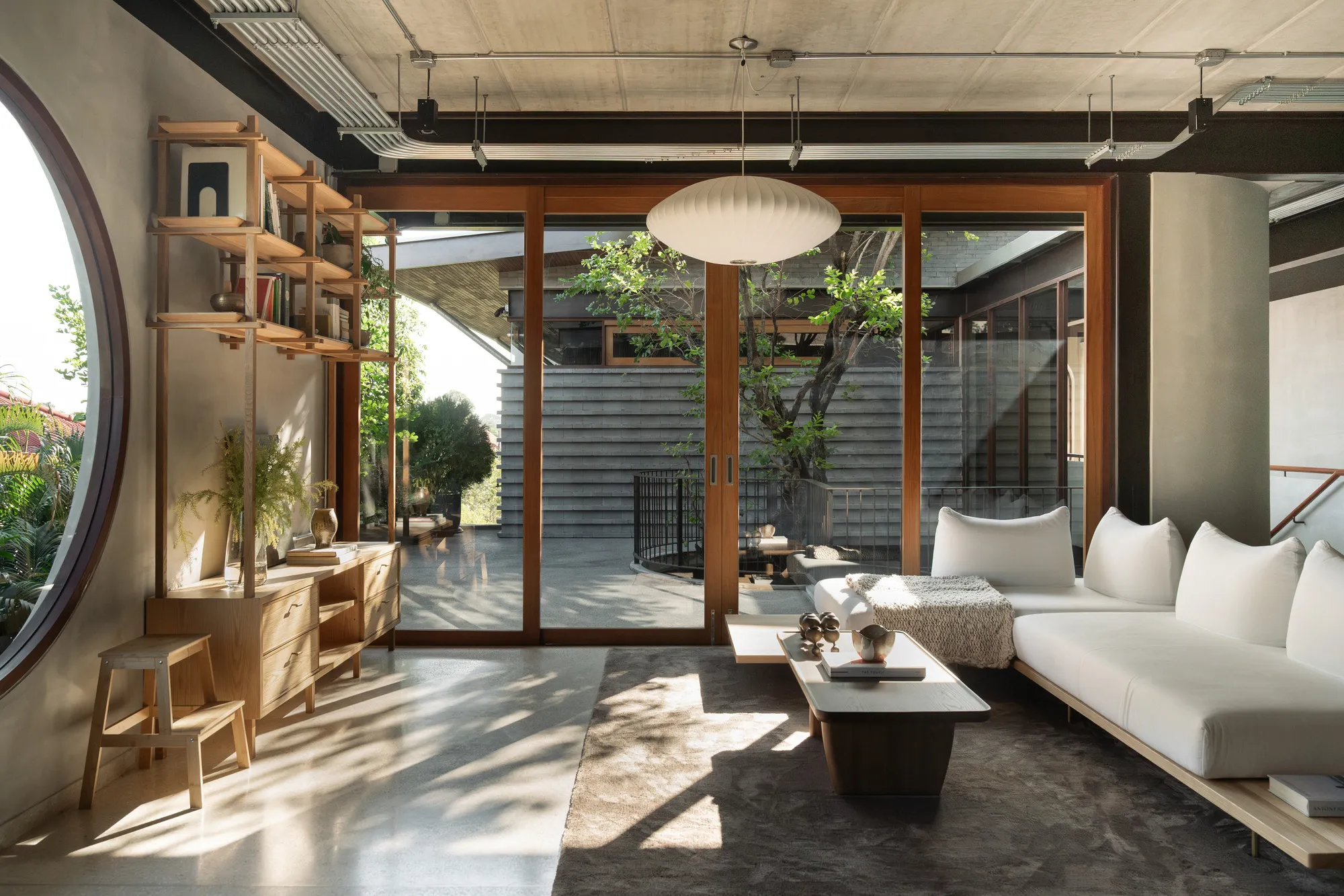 Only Human Translates Traditional Chinese Paintings into a Brick and Concrete House in Bangkok