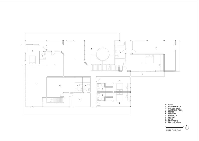 Second floor plan drawing showing master bedroom, bathroom, office and circular void above courtyard