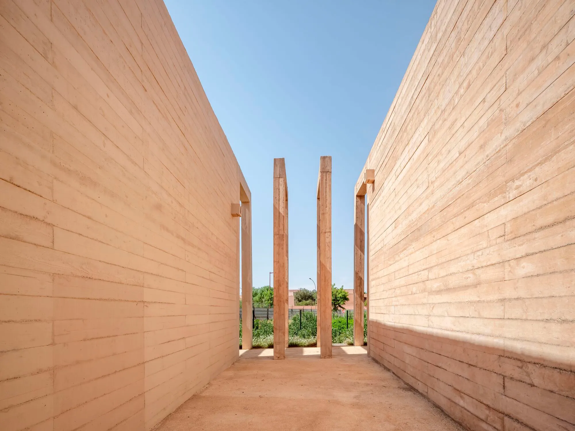 OUALALOU+CHOI Root a Regional Sports Campus in Moroccan Earth and Timber