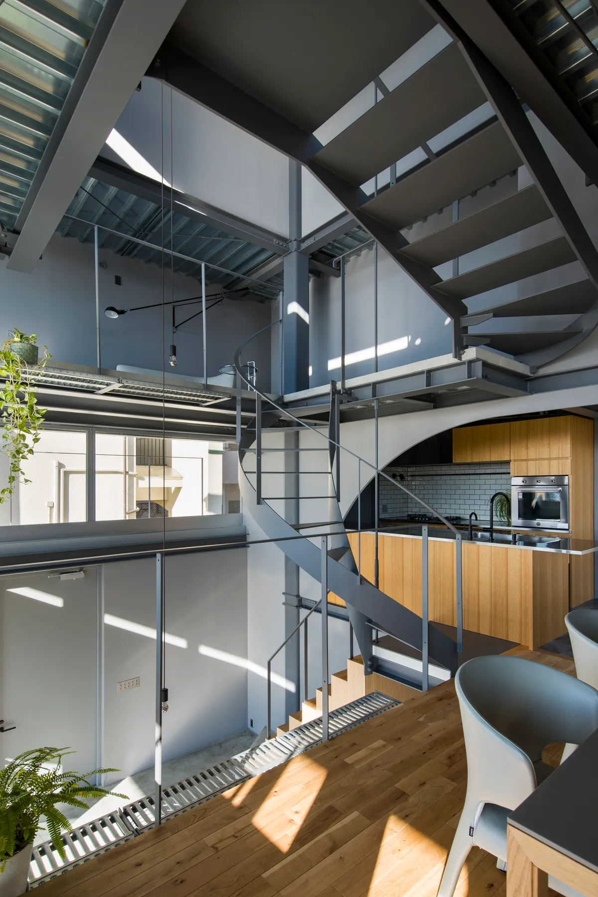 Tomohiro Hata Stacks a Spiral Stairhouse into Kobe's Steep Kitano Hillside