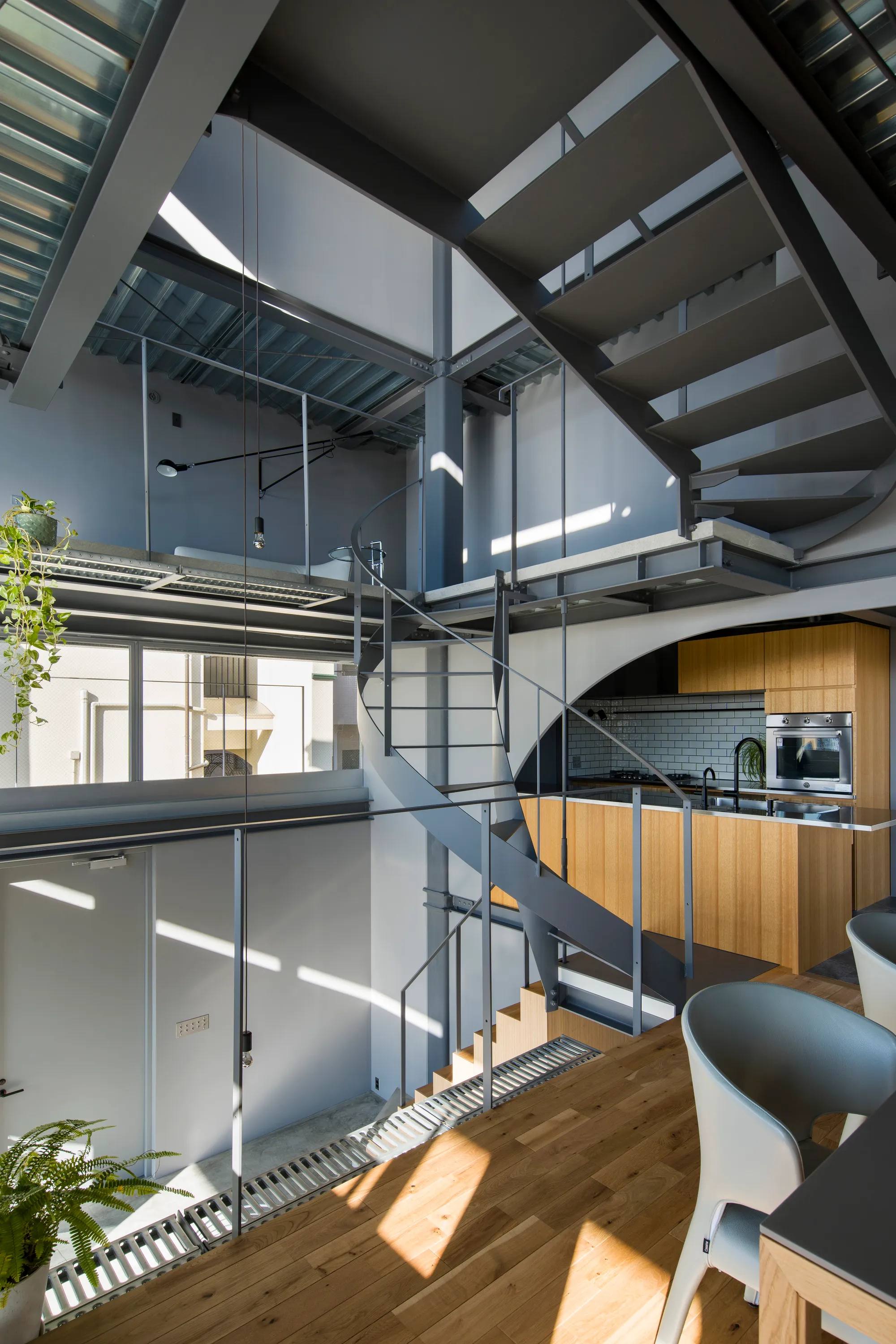 Tomohiro Hata Stacks a Spiral Stairhouse into Kobe's Steep Kitano Hillside