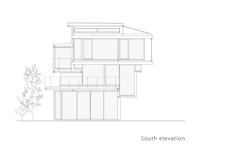 South elevation drawing showing stacked volumes with horizontal window bands and a tree