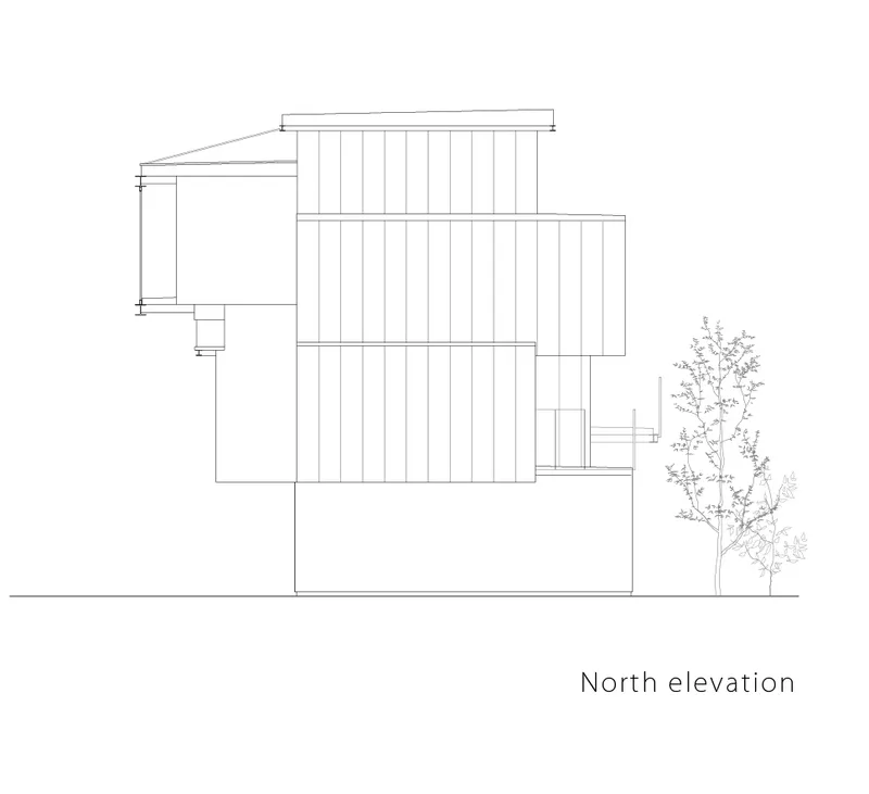 North elevation drawing showing vertical cladding and a sloped roof with a tree