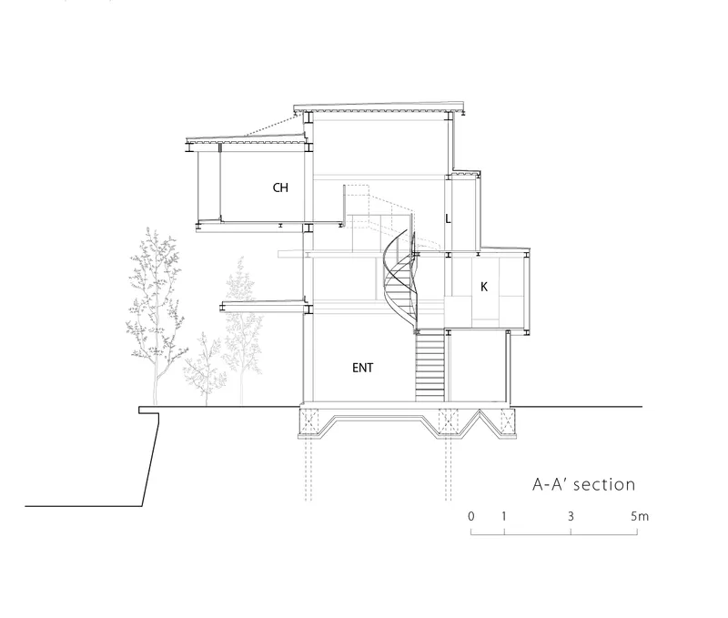 Section drawing revealing the spiral stair connecting levels between labeled rooms and foundation details
