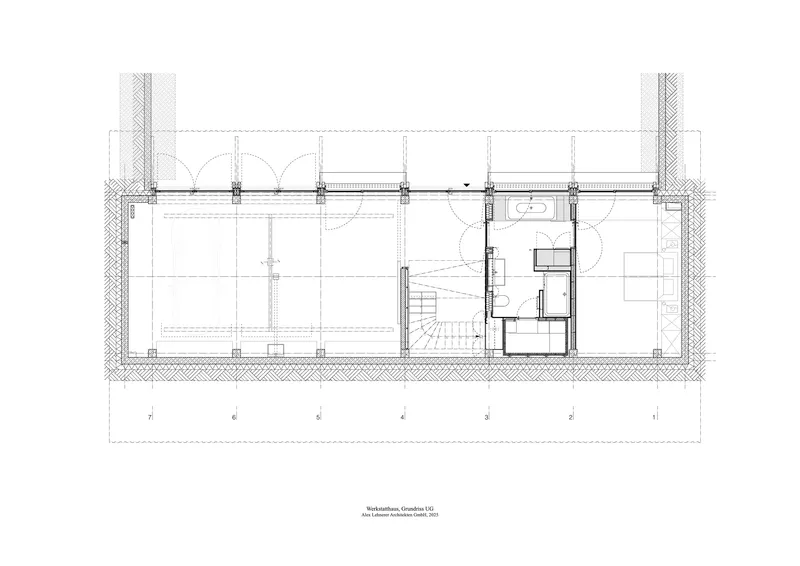 Floor plan drawing showing upper level with bathroom facilities and staircase at one end