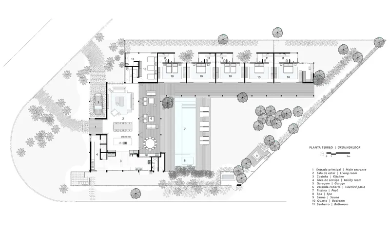 Site plan showing residential units along the upper edge, a central pool, and clustered trees throughout the property