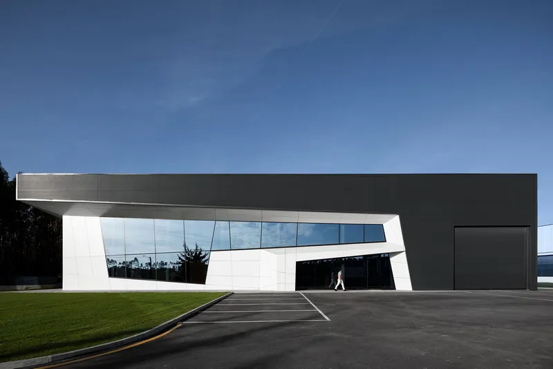 Monolithic form with faceted geometry shaping a bold contemporary identity.
