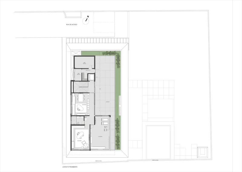First floor plan drawing showing a narrow residence with interior rooms and a lateral garden strip