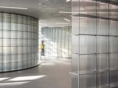 HCCH Studio Wraps a Shanghai High-Rise Office in Curved Walls of Translucent Glass