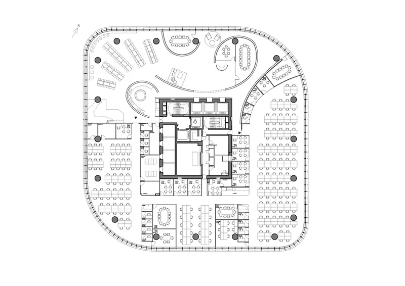 Floor plan drawing depicting workstations, enclosed offices and circulation paths around a central service core