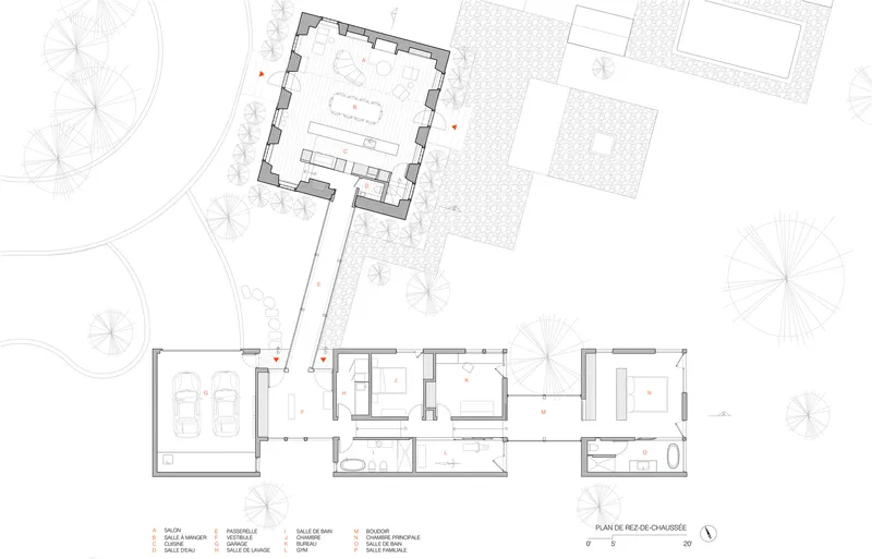 Ground floor plan drawing depicting garage, living spaces, and a square volume with surrounding paved terrace