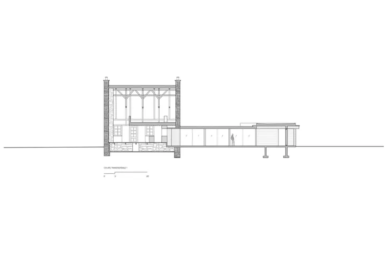 Transverse section drawing revealing the two-storey masonry volume with arched openings connected to lower extension