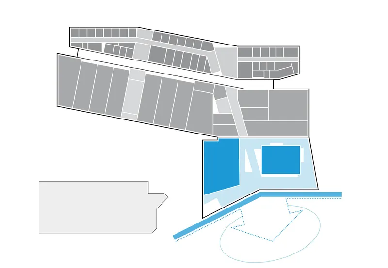 Site plan drawing with ground floor highlighted in blue adjacent to landscaped oval area