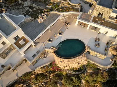 Nikos Adrianopoulos Carves an 820 m² Estate from Rock and Ritual on Mykonos