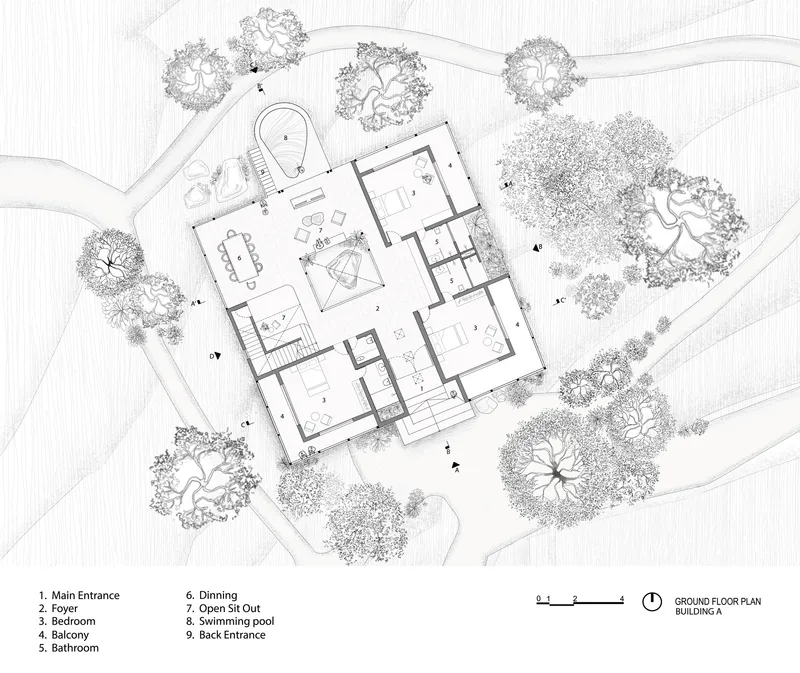 Ground floor plan drawing with rooms arranged around a central courtyard and landscaping with circular tree canopies