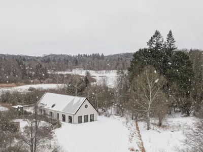 NORM Architects Distill a Danish Lakeside Home to Its Barn Essentials
