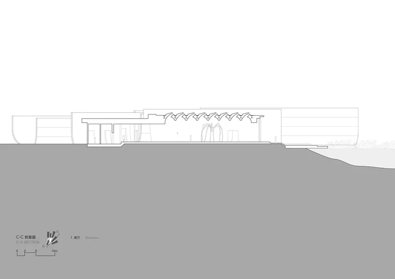 Section drawing revealing interior spaces beneath a zigzag roof profile on sloping terrain