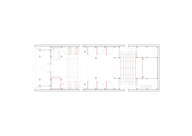 Floor plan drawing showing three connected volumes with room divisions and structural grid