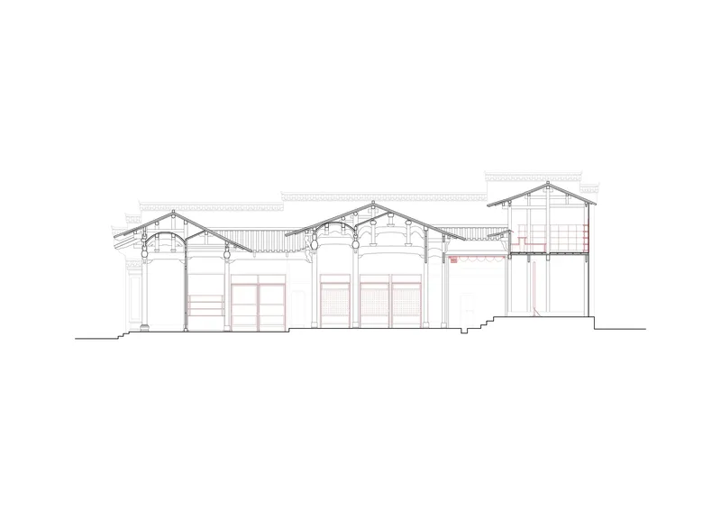 Section drawing revealing pitched roof structures with timber trusses and varying ceiling heights