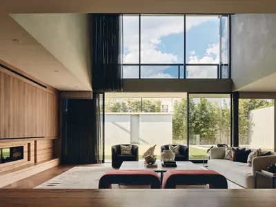 FGR Architects Wrap a Toorak Family Home in Monolithic Concrete That Dissolves at the Garden Edge