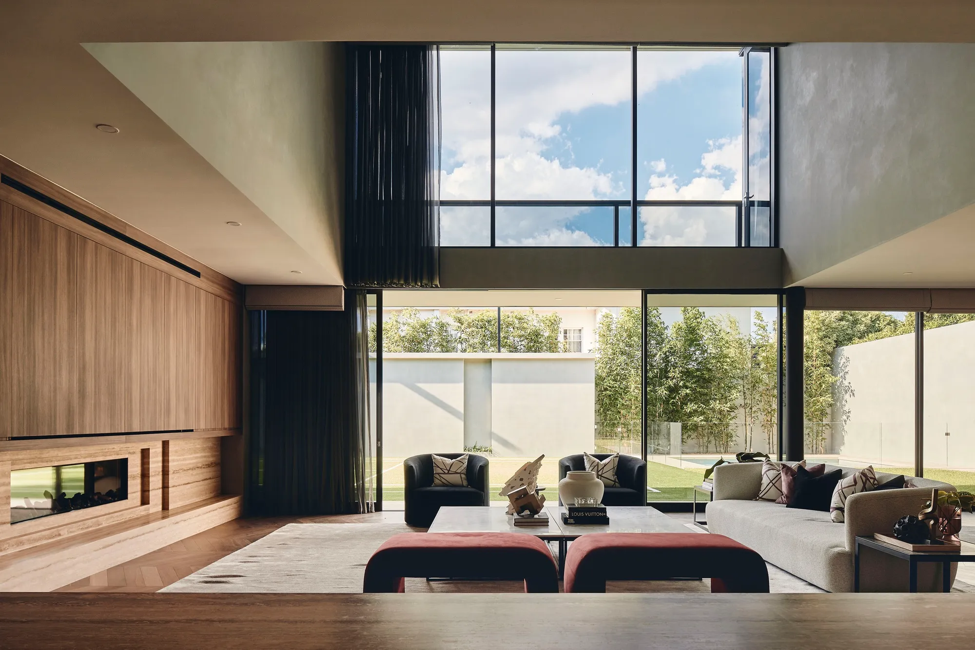 FGR Architects Wrap a Toorak Family Home in Monolithic Concrete That Dissolves at the Garden Edge