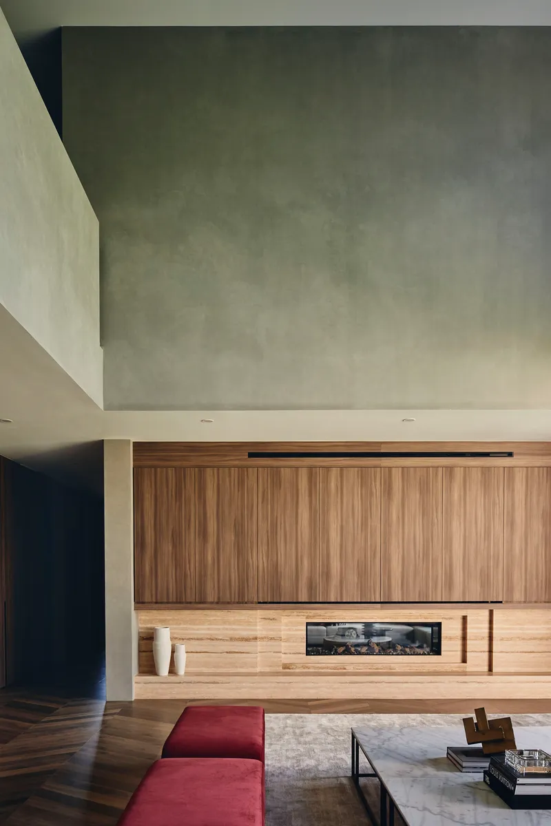 Living room with horizontal timber joinery and polished concrete ceiling