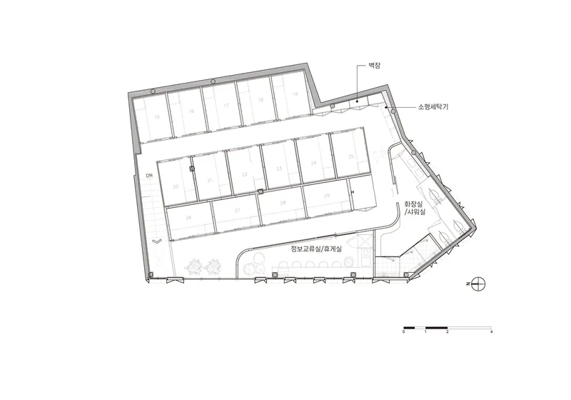 Floor plan drawing depicting similar layout with angled site boundary and interior divisions
